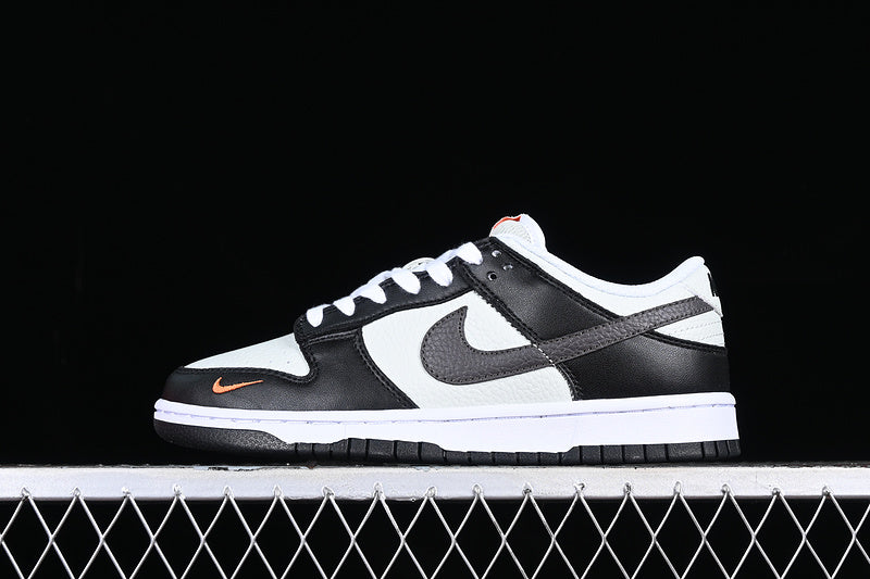 Nike Dunk Low
Black Total Orange Mini Swoosh