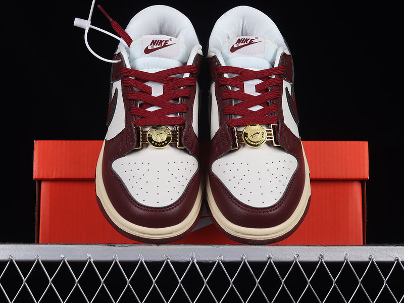 Nike Dunk Low SE
Sisterhood Sail Team Red