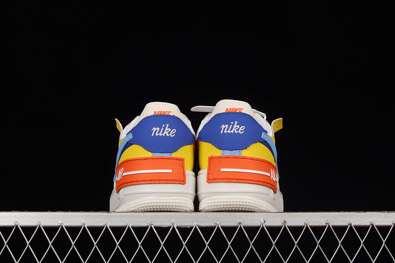 Nike Air Force 1 Low Shadow
Sail Game Royal Rush Orange University Blue