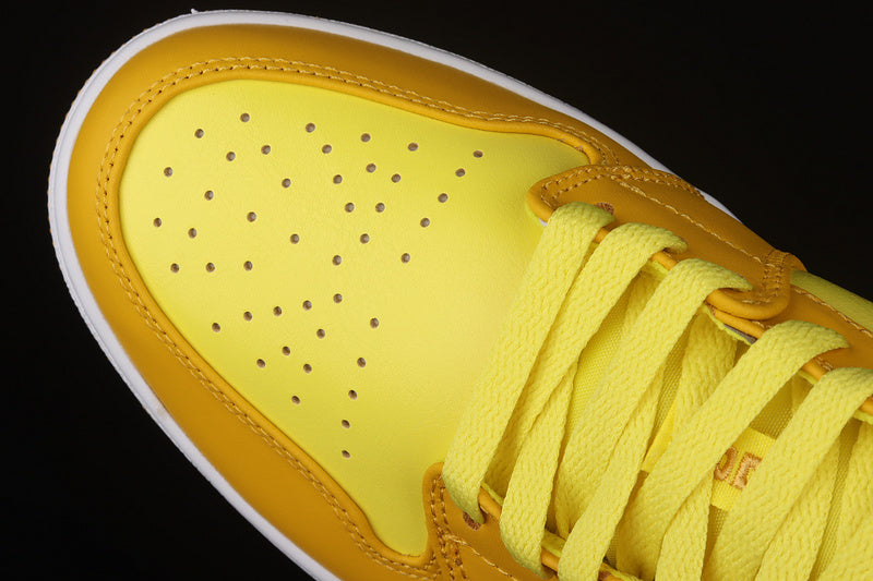 Jordan 1 Low
Yellow Strike