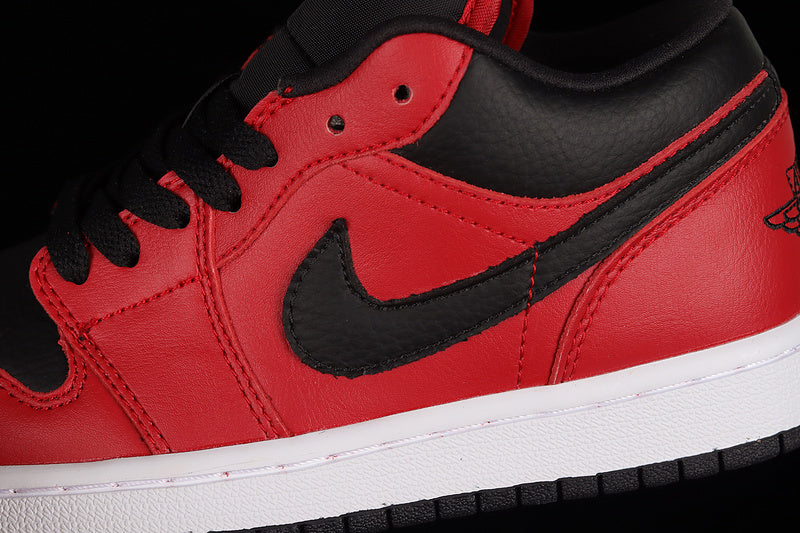 Jordan 1 Low
Reverse Bred Pebbled Swoosh