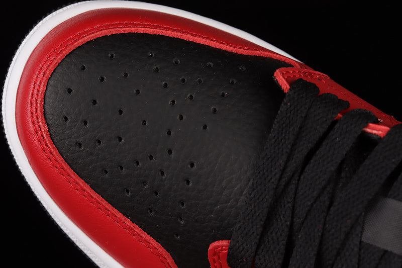 Jordan 1 Low
Reverse Bred Pebbled Swoosh