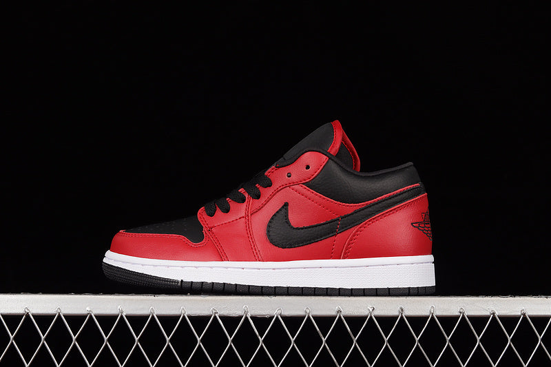 Jordan 1 Low
Reverse Bred Pebbled Swoosh